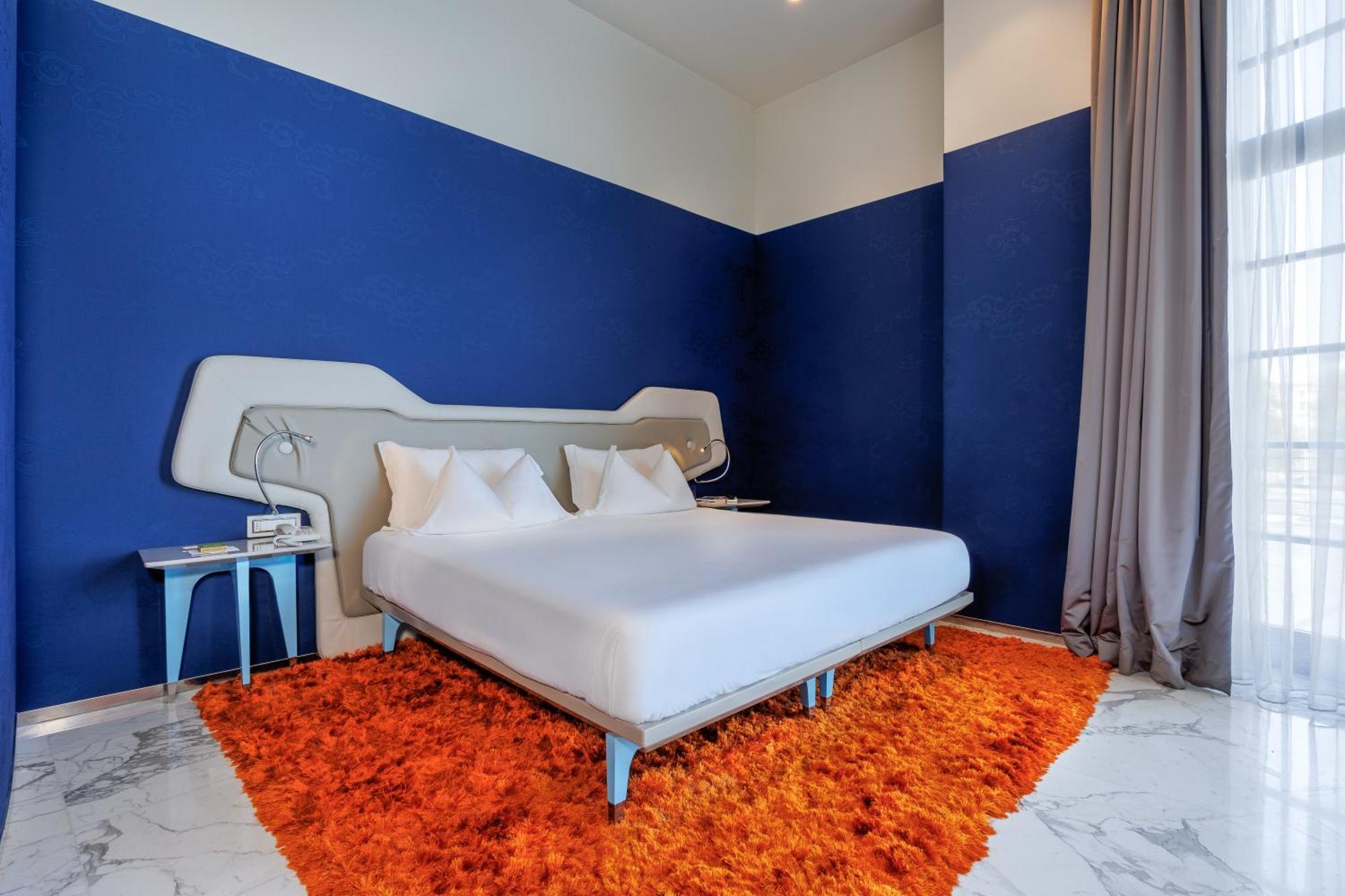 ไอเอช โฮเทล บาริ กรันเด อัลแบร์โก เดลเล นาซิโอนี Hotel บารี ภายนอก รูปภาพ A room at the hotel