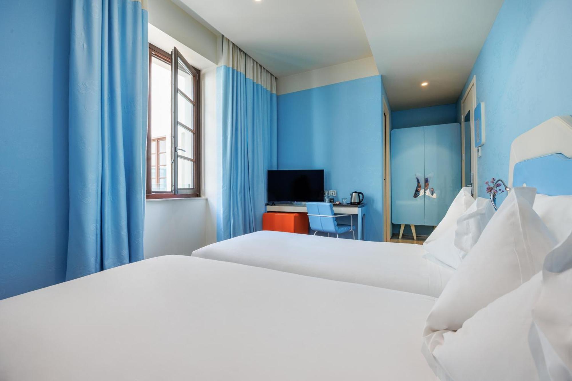 ไอเอช โฮเทล บาริ กรันเด อัลแบร์โก เดลเล นาซิโอนี Hotel บารี ภายนอก รูปภาพ A room at the hotel